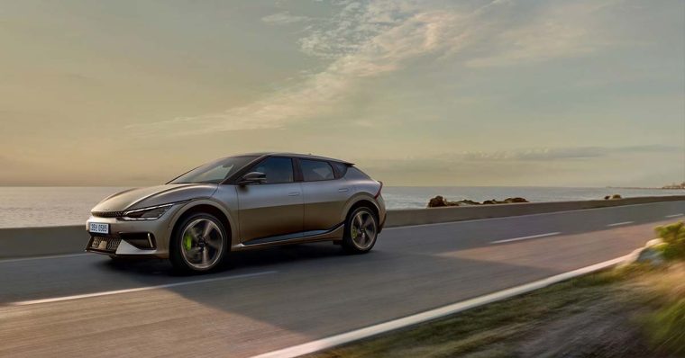 Kia EV6 GT driving along the seashore